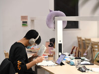 College students are reviewing for exams at the library of Nanjing Forestry University in Nanjing, China, on December 7, 2023. (