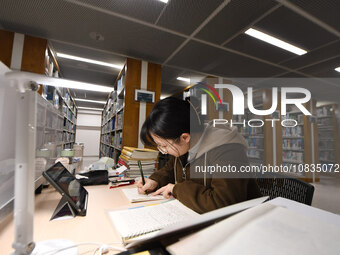 College students are reviewing for exams at the library of Nanjing Forestry University in Nanjing, China, on December 7, 2023. (