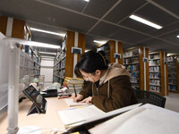 College students are reviewing for exams at the library of Nanjing Forestry University in Nanjing, China, on December 7, 2023. (