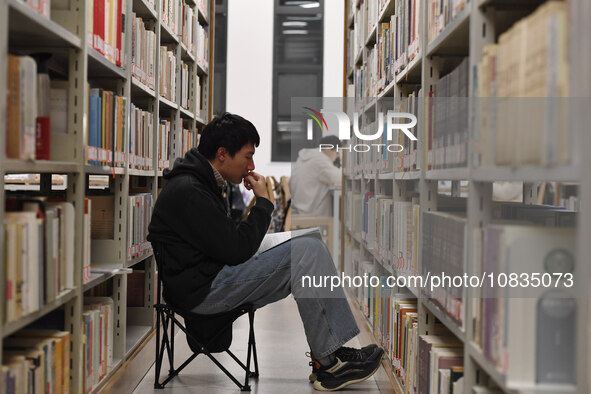 College students are reviewing for exams at the library of Nanjing Forestry University in Nanjing, China, on December 7, 2023. 