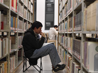 College students are reviewing for exams at the library of Nanjing Forestry University in Nanjing, China, on December 7, 2023. (