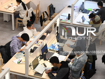 College students are reviewing for exams at the library of Nanjing Forestry University in Nanjing, China, on December 7, 2023. (