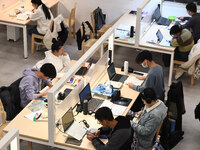 College students are reviewing for exams at the library of Nanjing Forestry University in Nanjing, China, on December 7, 2023. (