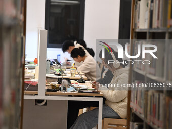 College students are reviewing for exams at the library of Nanjing Forestry University in Nanjing, China, on December 7, 2023. (