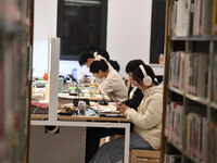 College students are reviewing for exams at the library of Nanjing Forestry University in Nanjing, China, on December 7, 2023. (