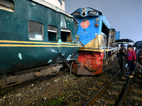 Rescue Workers Carry Out A Rescue Operation After A Passenger Train Collided With A Crane In Dhaka, Bangladesh, On December 7, 2023. At Leas...