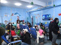 Parents are taking their children for infusion treatment at a hospital in Shenyang, Liaoning province, China, on December 8, 2023. (