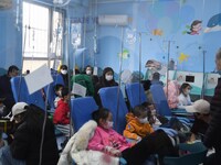 Parents are taking their children for infusion treatment at a hospital in Shenyang, Liaoning province, China, on December 8, 2023. (