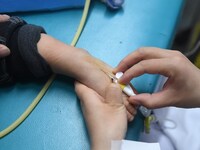 Parents are taking their children for infusion treatment at a hospital in Shenyang, Liaoning province, China, on December 8, 2023. (