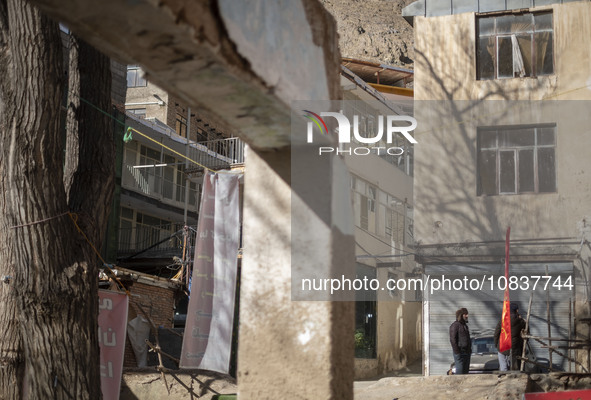 Buildings are standing in the flooded village of Imamzadeh Davood in the northwestern part of Tehran, on December 8, 2023, more than a year...