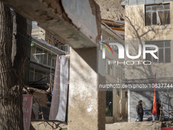 Buildings are standing in the flooded village of Imamzadeh Davood in the northwestern part of Tehran, on December 8, 2023, more than a year...