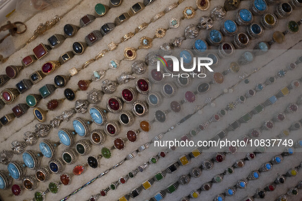 Jewelry is being placed at a shop in a bazaar in the flooded village of Imamzadeh Davood in the northwestern part of Tehran, more than one y...