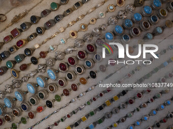 Jewelry is being placed at a shop in a bazaar in the flooded village of Imamzadeh Davood in the northwestern part of Tehran, more than one y...