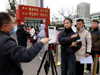 Candidates are taking part in the written test for the 2024 Shandong Provincial Examination for civil servants in Zaozhuang, Shandong Provin...