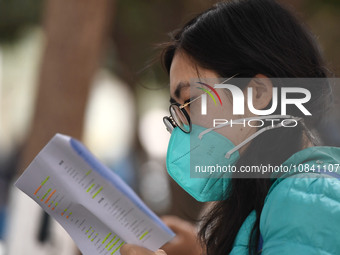 Candidates are waiting to enter the written exam of the Jiangsu 2024 civil servant exam in Nanjing, Jiangsu Province, China, on December 10,...