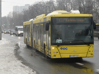 Buses are running between the closed metro stations of the Blue Line in Kyiv, Ukraine, on December 11, 2023. Train traffic on the Blue Line...