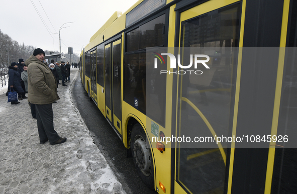 Buses are running between the closed metro stations of the Blue Line in Kyiv, Ukraine, on December 11, 2023. Train traffic on the Blue Line...