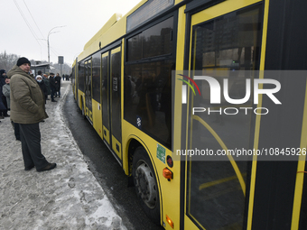 Buses are running between the closed metro stations of the Blue Line in Kyiv, Ukraine, on December 11, 2023. Train traffic on the Blue Line...