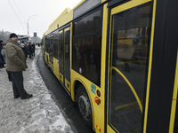 Buses are running between the closed metro stations of the Blue Line in Kyiv, Ukraine, on December 11, 2023. Train traffic on the Blue Line...