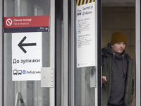 In Kyiv, Ukraine, on December 11, 2023, a man is leaving the Teremky metro station on the Blue Line, which is closed due to repairs. Train t...