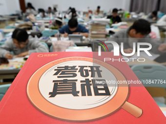 Candidates are preparing for the 2024 national postgraduate entrance exam at Hebei University of Engineering in Handan, North China's Hebei...