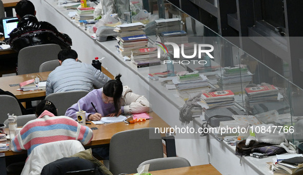 Candidates are preparing for the 2024 national postgraduate entrance exam at Hebei University of Engineering in Handan, North China's Hebei...