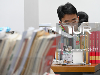 Candidates are preparing for the 2024 national postgraduate entrance exam at Hebei University of Engineering in Handan, North China's Hebei...