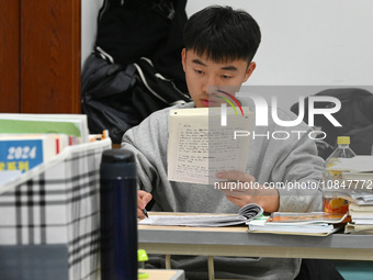 Candidates are preparing for the 2024 national postgraduate entrance exam at Hebei University of Engineering in Handan, North China's Hebei...