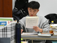 Candidates are preparing for the 2024 national postgraduate entrance exam at Hebei University of Engineering in Handan, North China's Hebei...