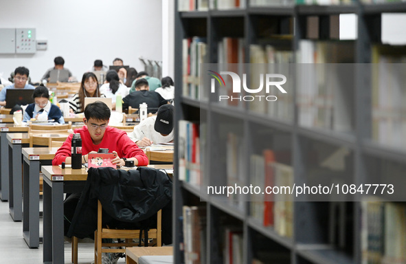 Candidates are preparing for the 2024 national postgraduate entrance exam at Hebei University of Engineering in Handan, North China's Hebei...