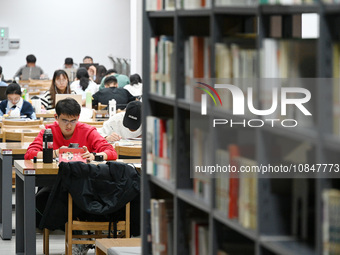 Candidates are preparing for the 2024 national postgraduate entrance exam at Hebei University of Engineering in Handan, North China's Hebei...