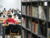 Candidates are preparing for the 2024 national postgraduate entrance exam at Hebei University of Engineering in Handan, North China's Hebei...