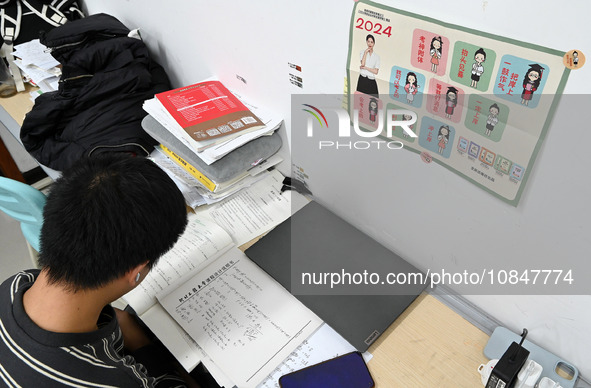 Candidates are preparing for the 2024 national postgraduate entrance exam at Hebei University of Engineering in Handan, North China's Hebei...