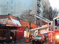 A fire is occurring at Broadway and 231st in the Bronx, New York, on December 13, 2023. No one is hurt, but it is destroying a few businesse...