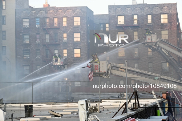 A fire is occurring at Broadway and 231st in the Bronx, New York, on December 13, 2023. No one is hurt, but it is destroying a few businesse...