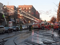 A fire is occurring at Broadway and 231st in the Bronx, New York, on December 13, 2023. No one is hurt, but it is destroying a few businesse...