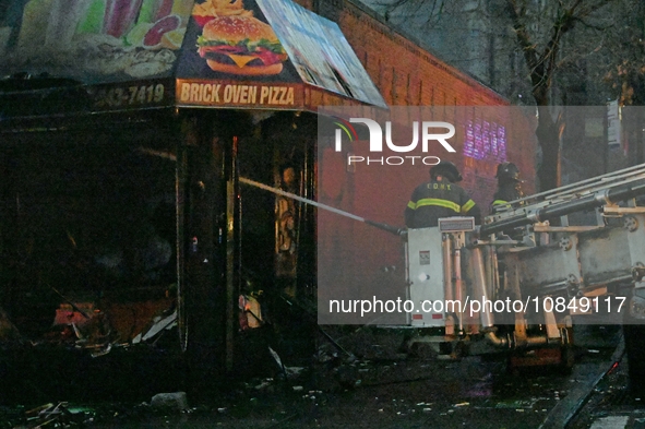 A fire is occurring at Broadway and 231st in the Bronx, New York, on December 13, 2023. No one is hurt, but it is destroying a few businesse...