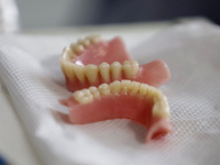 Dental prostheses are being displayed inside the Centro de Odontogeriatria Centro de Salud TIII Doctor Guillermo Roman y Carrillo, located i...