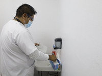 Medical personnel at the Geriatric Dentistry Clinic in the Iztapalapa mayor's office, Mexico City, are receiving patients for the applicatio...