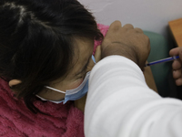 Medical personnel from the Geriatric Dentistry Clinic in the Iztapalapa mayor's office, Mexico City, are administering the Cuban Abdala vacc...