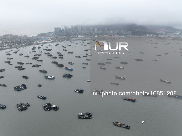 Fishing boats are moored at the central fishing port of Liandao to avoid wind and waves in Lianyungang, Jiangsu Province, China, on December...