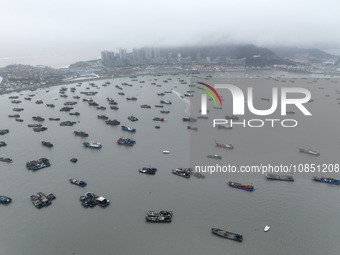 Fishing boats are moored at the central fishing port of Liandao to avoid wind and waves in Lianyungang, Jiangsu Province, China, on December...