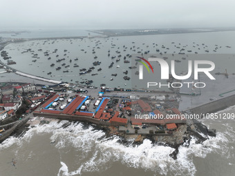 Fishing boats are moored at the central fishing port of Liandao to avoid wind and waves in Lianyungang, Jiangsu Province, China, on December...