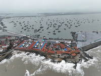 Fishing boats are moored at the central fishing port of Liandao to avoid wind and waves in Lianyungang, Jiangsu Province, China, on December...