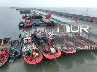 Fishing boats are moored at the central fishing port of Liandao to avoid wind and waves in Lianyungang, Jiangsu Province, China, on December...