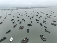 Fishing boats are moored at the central fishing port of Liandao to avoid wind and waves in Lianyungang, Jiangsu Province, China, on December...