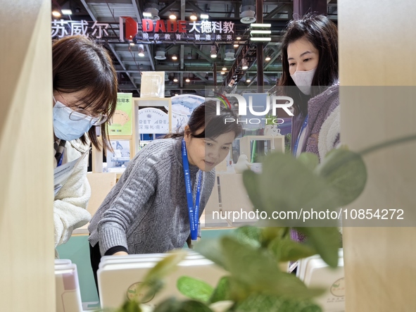 Visitors are attending the first Jiangsu (Suzhou) Educational Equipment Exhibition in Suzhou, Jiangsu Province, China, on December 15, 2023....