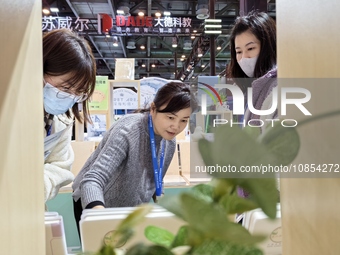 Visitors are attending the first Jiangsu (Suzhou) Educational Equipment Exhibition in Suzhou, Jiangsu Province, China, on December 15, 2023....