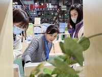 Visitors are attending the first Jiangsu (Suzhou) Educational Equipment Exhibition in Suzhou, Jiangsu Province, China, on December 15, 2023....