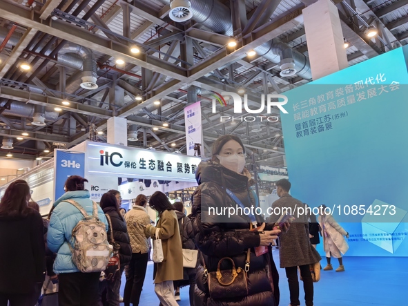 Visitors are attending the first Jiangsu (Suzhou) Educational Equipment Exhibition in Suzhou, Jiangsu Province, China, on December 15, 2023....